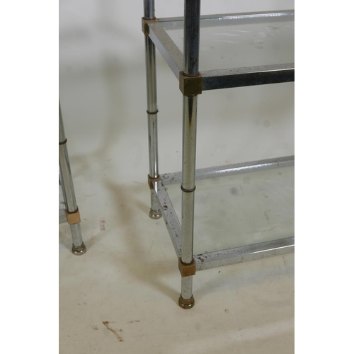 1108 - A pair of chrome and brass mounted five tier etageres/open shelves, with glass tops, 31