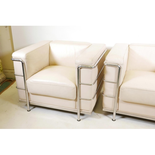 1121 - A pair of Le Corbusier style white leather and chrome LC2 armchairs, 35