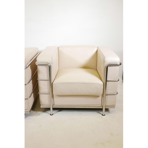 1121 - A pair of Le Corbusier style white leather and chrome LC2 armchairs, 35