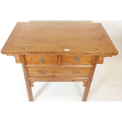 1129 - A Chinese elm side table with two short drawers over a single long drawer, 39½