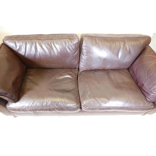 1149 - A Marks and Spencer brown leather two seater sofa, 84