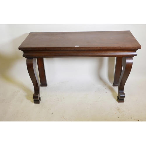 1151 - A William IV mahogany console table, with moulded frieze and scrolled supports, 50