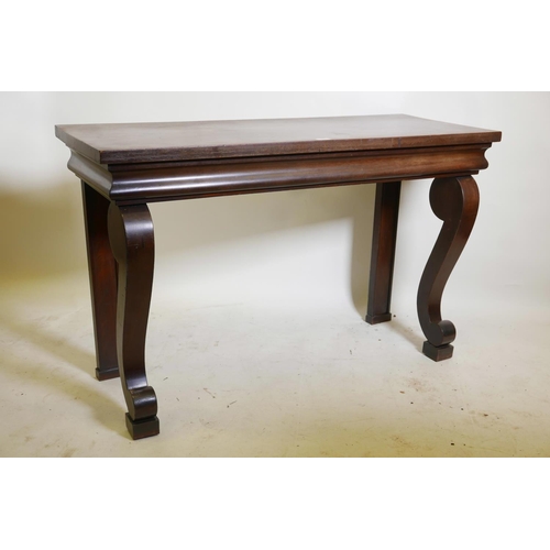 1151 - A William IV mahogany console table, with moulded frieze and scrolled supports, 50