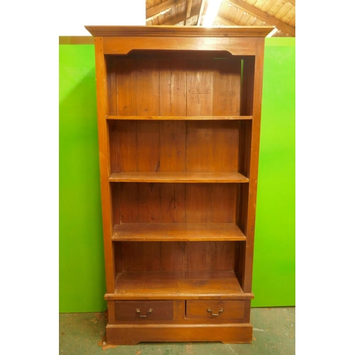 1154 - A hardwood open bookcase with fixed shelves and two drawers, 39