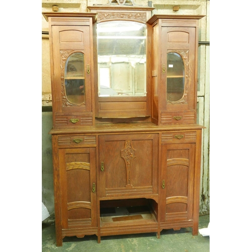 1155 - A Dutch Art Nouveau oak mirror back sideboard in two sections, with carved pear tree decoration and ... 