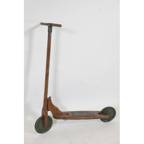 1167 - A vintage beech and elm 'Eureka' child's scooter, c.1920, 35