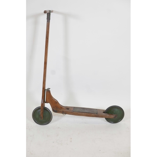 1167 - A vintage beech and elm 'Eureka' child's scooter, c.1920, 35