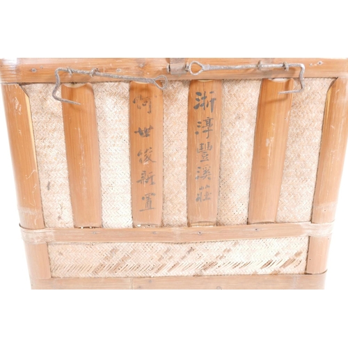 117 - A Japanese bamboo and rattan chest/basket, 20