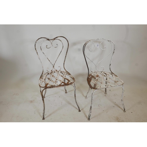 1178 - A near pair of vintage, painted wrought iron garden chairs