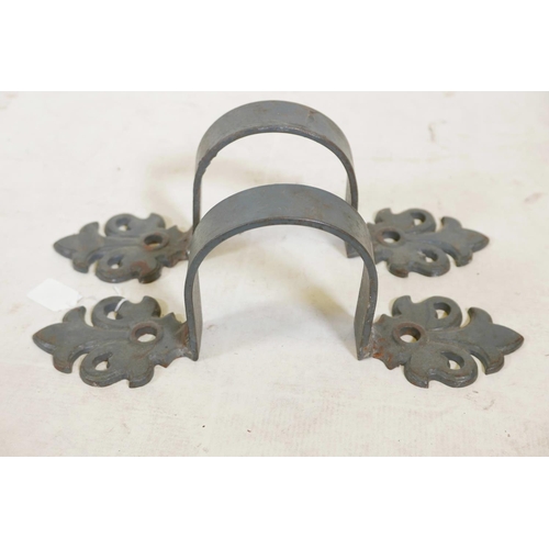 1182 - A pair of decorative painted steel downpipe brackets, 15