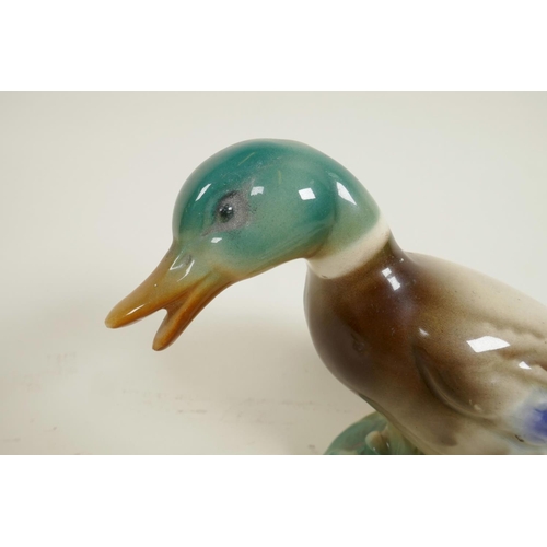 120 - A set of thee 1940s Keele Street Pottery graduated flying wall ducks, hand painted and glazed plaque... 