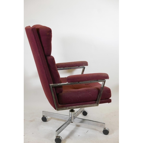 1202 - An American tilt and swivel chrome plated open arm desk chair, last quarter of C20th