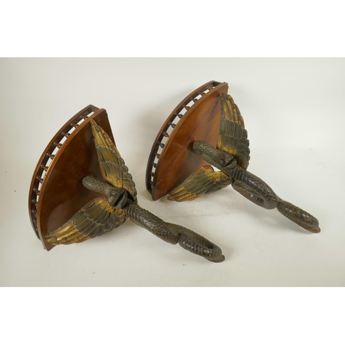 1215 - A pair of C19th mahogany corner wall brackets with bobbin turned galleries supported on carved and p... 