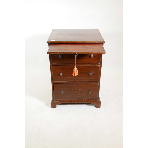 1221 - A mahogany three drawer chest with brushing slide on bracket feet, 34