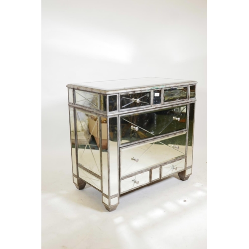 1222 - A contemporary mirror glass chest of two over four drawers, A/F glass cracked on three drawers, 34