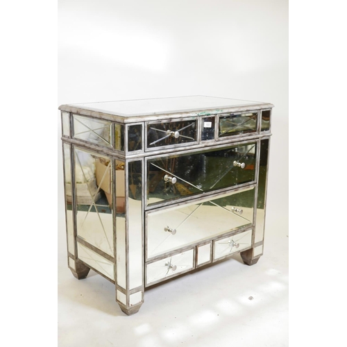 1222 - A contemporary mirror glass chest of two over four drawers, A/F glass cracked on three drawers, 34