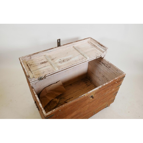 1226 - An Indian teak chest with brass mounts and hinged fold over top, 36