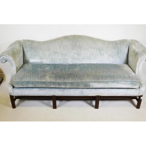 1228 - A Chippendale style humpback settee, with scroll arms, raised on moulded square supports, mid C20th,... 