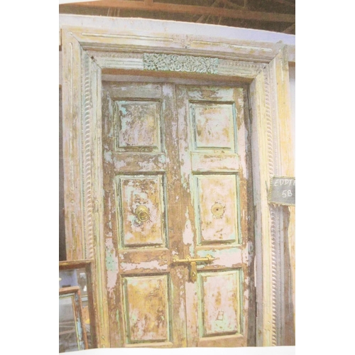 1230 - Architectural salvage: A pair of Indian teak storm doors, with frame, each door with four moulded an... 