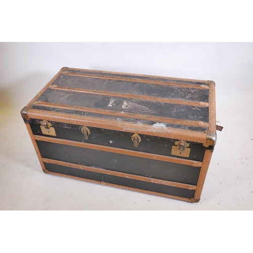 1234 - A vintage wood travelling trunk, with metal strapwork, 44