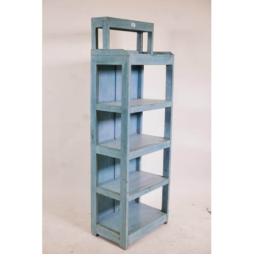 1237 - An Indian painted hardwood six tier open shelf with stepped top, 19