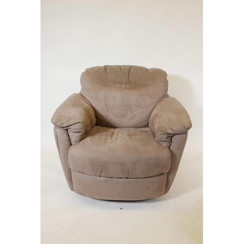 1244 - An Italian Natuzzi Gratitudine C163 swivel glider chair in brown suede