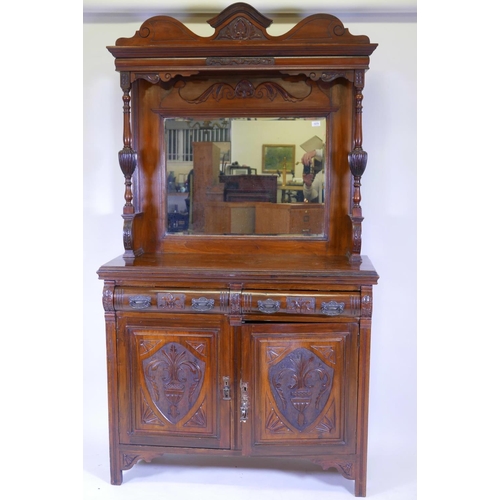 1253 - A Victorian walnut mirror backed sideboard with shaped top and bevelled glass over two moulded front... 