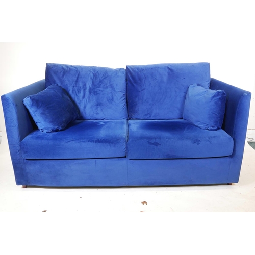 1257 - A Made 'Milner' two seater sofa bed in blue velvet