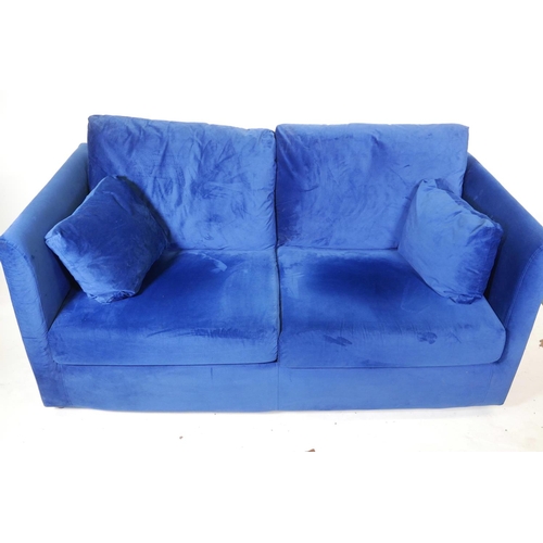 1257 - A Made 'Milner' two seater sofa bed in blue velvet