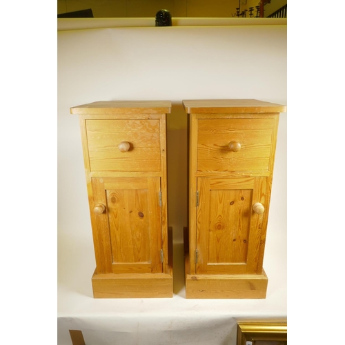 1258 - A pair of pine bedside chests of small proportions, on plinth bases, 15