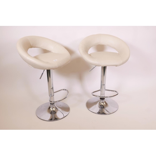 1260 - A pair of contemporary adjustable bar stools with  leatherette covers, A/F