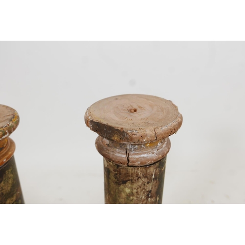 127 - A pair of antique painted faux marble and parcel gilt columns, A/F historic woodworm damage to capit... 