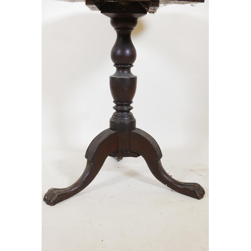 1278 - An American Federal style mahogany tilt top occasional table, with crossbanded top, turned column an... 