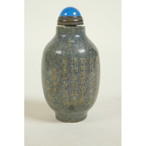 128 - A Chinese hardstone snuff bottle with engraved and gilt character inscription, mark to base, 3