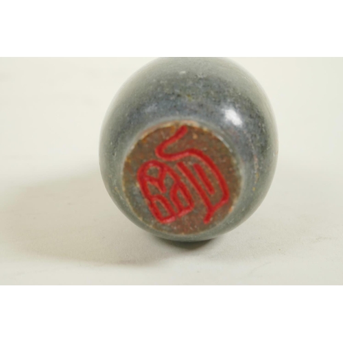 128 - A Chinese hardstone snuff bottle with engraved and gilt character inscription, mark to base, 3