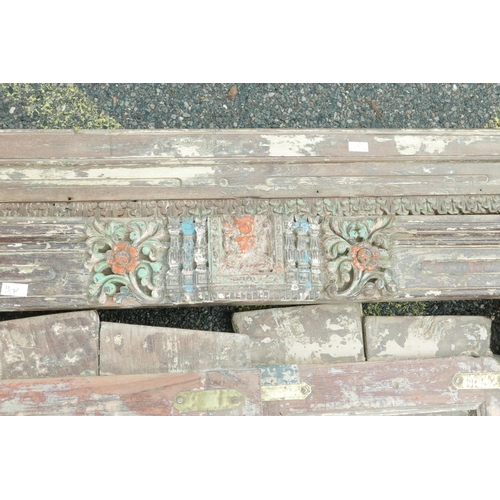 1292 - Architectural salvage: A pair of Indian teak storm doors and frame, with carved details, each door w... 