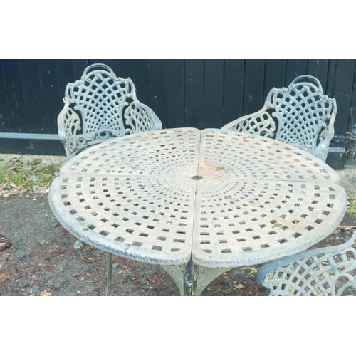 1297 - A painted, wrought iron Victorian style garden table and three chairs, 40