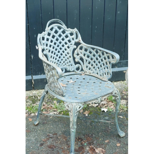 1297 - A painted, wrought iron Victorian style garden table and three chairs, 40