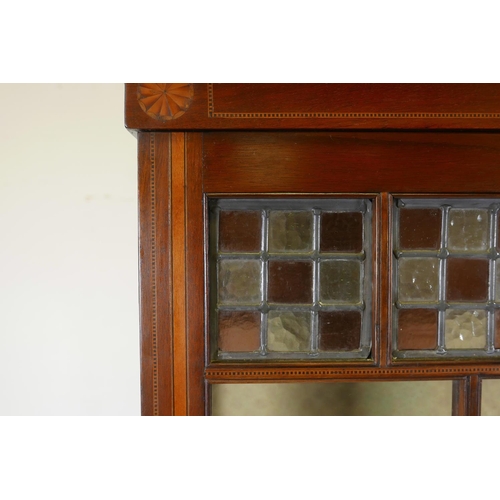 1303 - An Arts and Crafts style inlaid mahogany display cabinet, adapted, 43