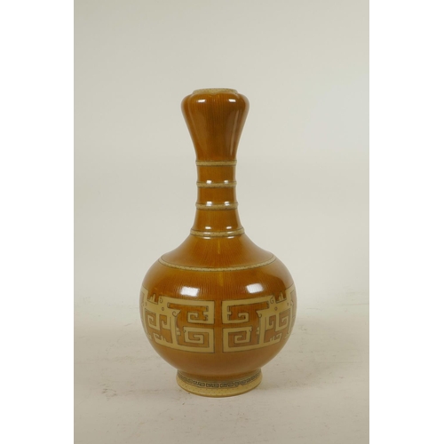 145 - A Chinese garlic head shaped porcelain vase with imitation brown bamboo style glaze and archaic styl... 