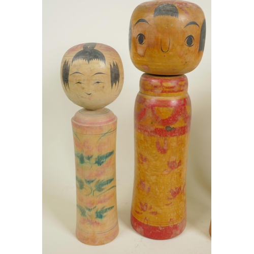 161 - Four Japanese turned and painted wood Kokeshi dolls, largest 12