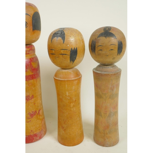 161 - Four Japanese turned and painted wood Kokeshi dolls, largest 12