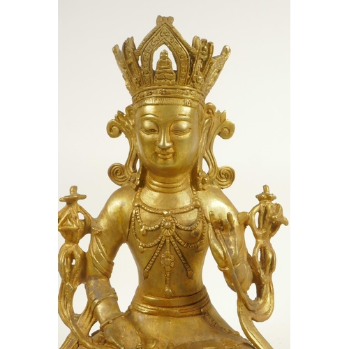 173 - A Sino-Tibetan gilt bronze of Buddha seated in meditation, double vajra mark to base, 11½