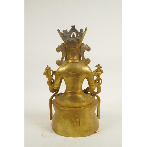 173 - A Sino-Tibetan gilt bronze of Buddha seated in meditation, double vajra mark to base, 11½