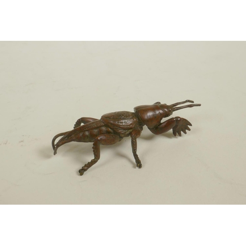 178 - A Japanese Jizai style bronze of an insect, impressed mark to base, 2½