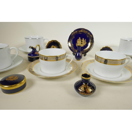 190 - A pair of Limoges porcelain Philippe Deshoulieres Orleans Pattern teacups and saucers, with decorati... 