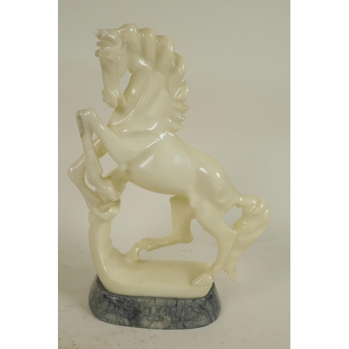 197 - A carved alabaster figure of a horse, 9