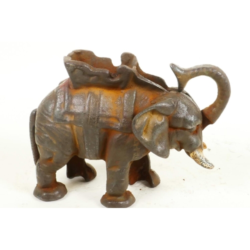 198 - A cast iron trick moneybox cast as an elephant with howdah, 5