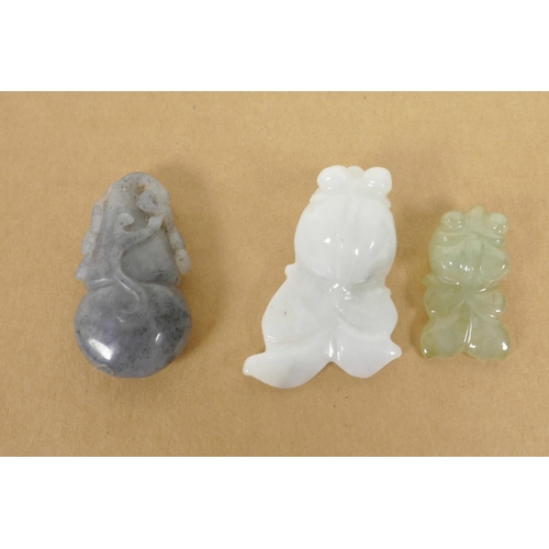 199 - Three small Chinese carved jade amulets, largest 1½