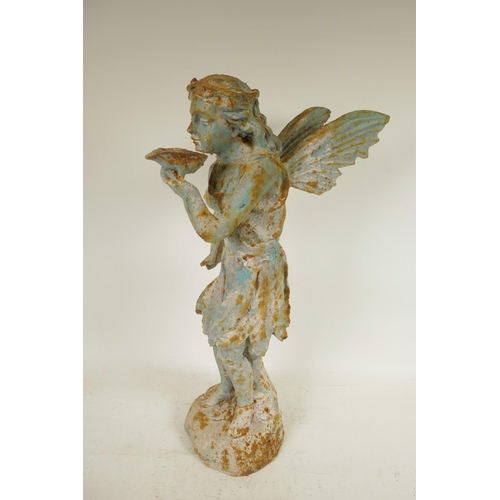 21 - A cast iron garden figure of a fairy drinking from a lily pad, 21